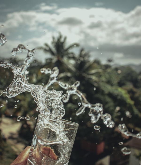 Person feeling energized and refreshed in a natural setting.